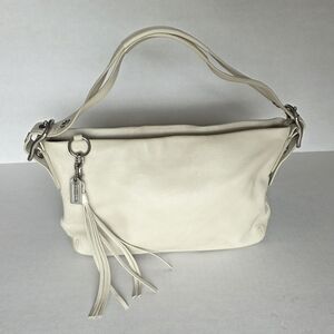 COACH Pebbled Leather Shoulder Bag with Tassel Charm Cream Color